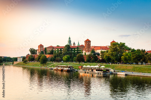 Krakow. Poland. Wawel on the river. Castle, the cathedral and the tomb of Polish kings. Summer. Sunset.
