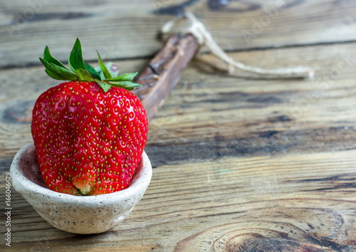 strawberries on handemade spoons photo