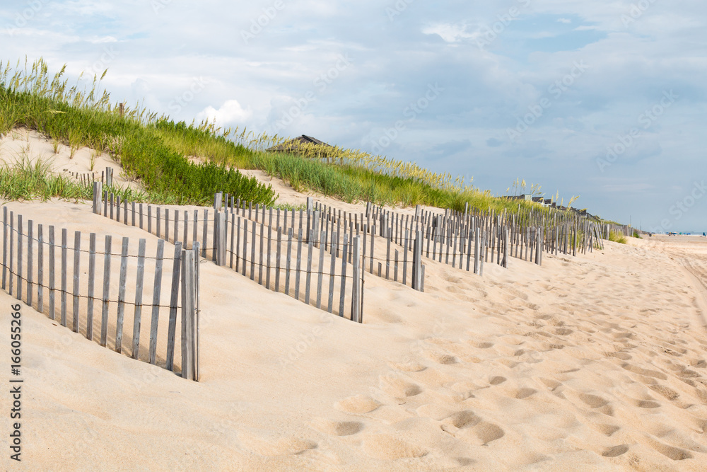 Rows of sand fences line the beach in Nags Head, North Carolina on the