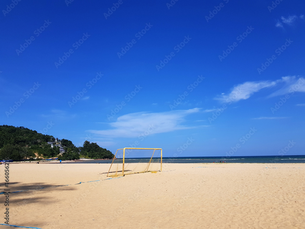 Beach and blue sky / A beach is a land along a body of water. It usually consists of loose particles, which are often composed of rock, such as sand, gravel, shingle, pebbles