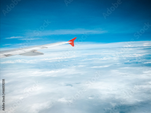 sky and cloud with airplane wing