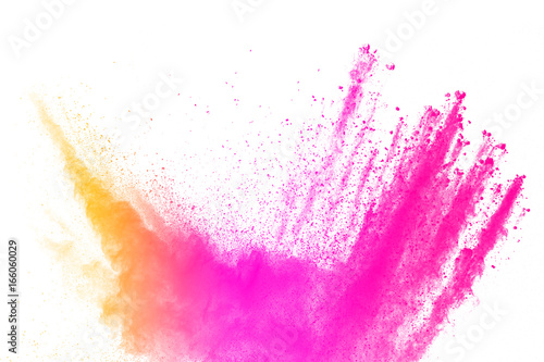 abstract multicolored powder splatted on white background Freeze motion of color powder exploding