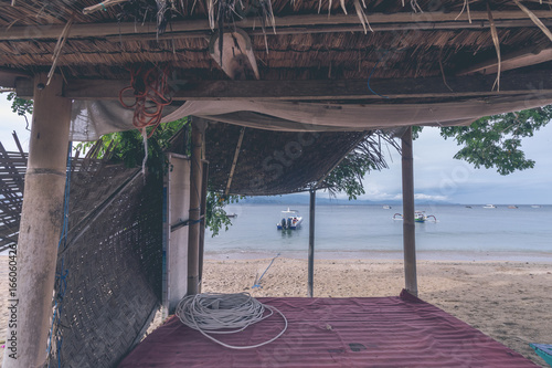 Lonely gazebo on the beach of tropical island Nusa Lembongan, Bali, Indonesia. photo