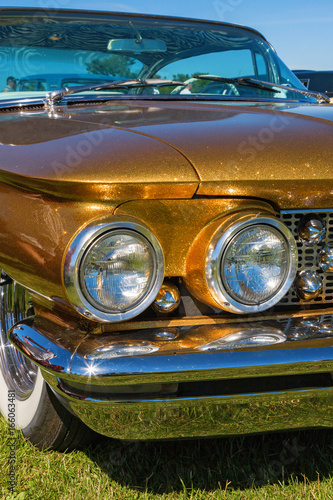 Gold metallic paint on an old American car