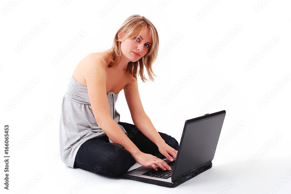 Naklejka premium Young girl with laptop