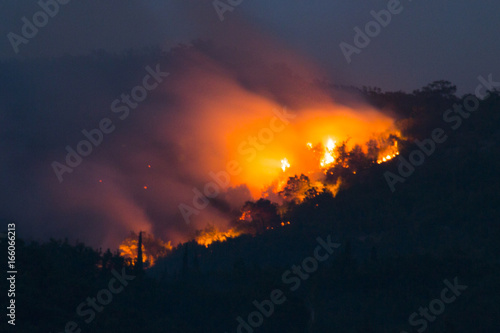 Huge forest fires during the night on the mountains close to Herceg Novi and the bay of Kotor in Montenegro 