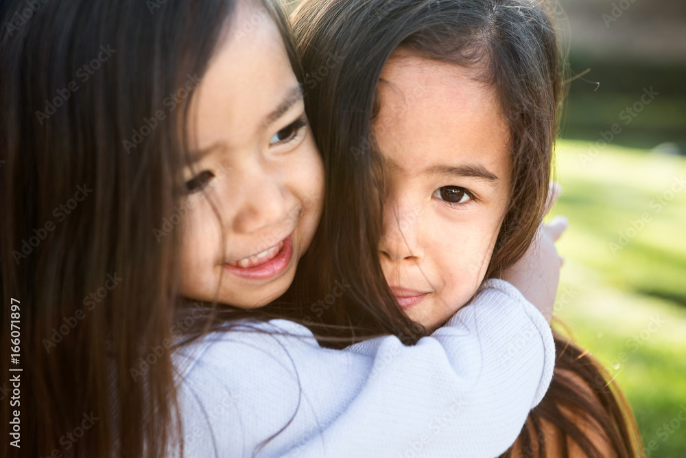 Cute little girls hugging. Sisters and best friends. Cute little girls hugging. Sisters and best friends.