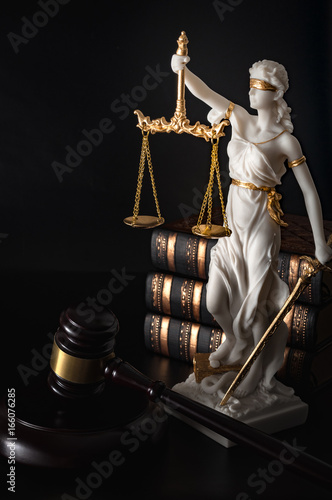 Fotografie Legal code, enforcement of the law and blind Iustitia concept with statue of the