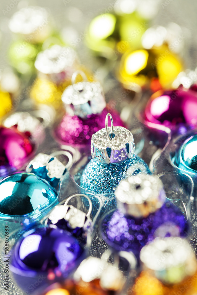 Bright multicolored christmas balls in rows Bright multicolored christmas balls in rows
