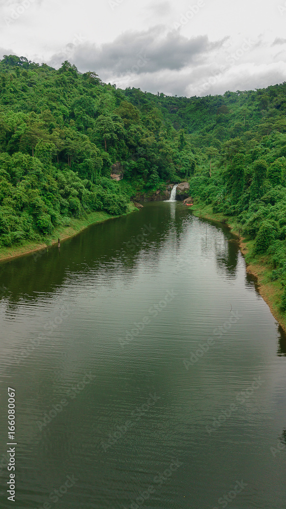 Waterfall in the middle of the forest. Bird eye view , drone.