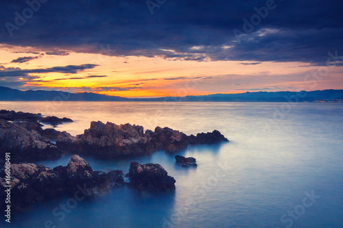 Fototapeta Naklejka Na Ścianę i Meble -  Colored sunset over the sea