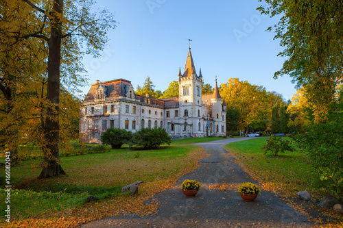 Old fairy-tale palace in Stameriena, Latvia. Fall time, bright colors at sunset