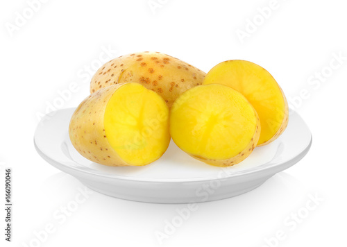 potatoes in white plate on white background