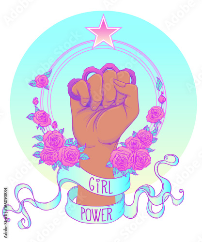 Fight like a girl. Woman's hand with crystal quartz brass knuckles. Fist raised up. Girl Power. Feminism concept.