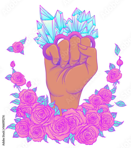 Fight like a girl. Woman's hand with crystal quartz brass knuckles. Fist raised up. Girl Power. Feminism concept.