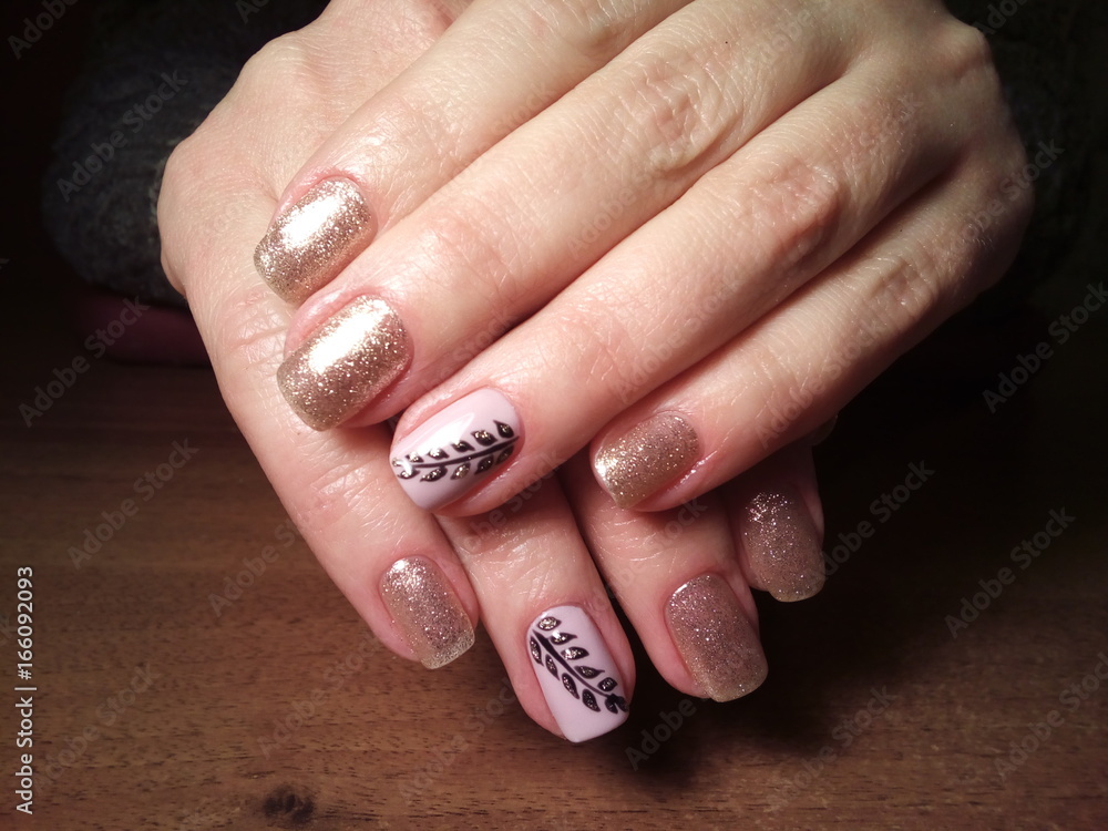 The manicurist excellently made her work a beautiful manicure with a polish gel on her hands and the client is happy The manicurist excellently made her work a beautiful manicure with a polish gel on her hands and the client is happy