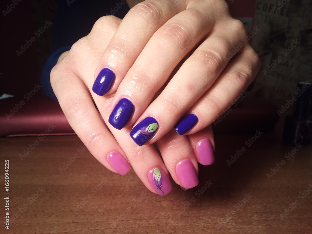 The manicurist excellently made her work a beautiful manicure with a polish gel on her hands and the client is happy The manicurist excellently made her work a beautiful manicure with a polish gel on her hands and the client is happy