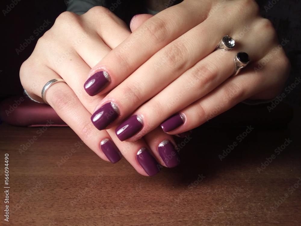 The manicurist excellently made her work a beautiful manicure with a polish gel on her hands and the client is happy The manicurist excellently made her work a beautiful manicure with a polish gel on her hands and the client is happy