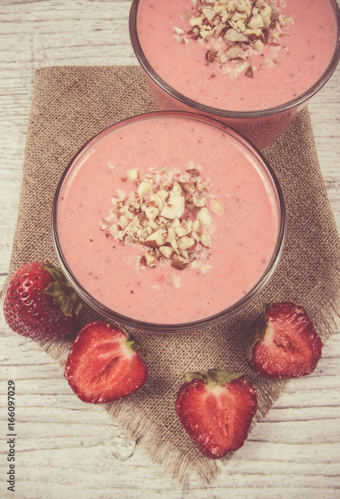 Strawberry smoothie with fresh fruit . Strawberry smoothie with fresh fruit .