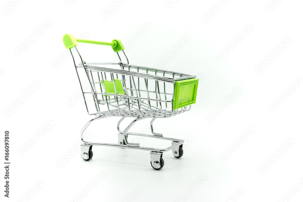 Green miniature shopping cart isolated on white