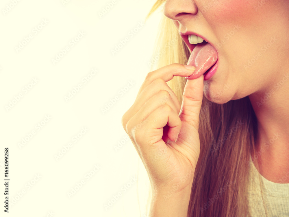 Woman having something disgusting on tongue Woman having something disgusting on tongue