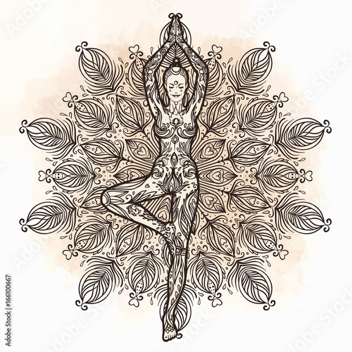 Pretty girl in yoga pose over ornate round mandala pattern. Yoga concept. Decorative design for cover, t-shirt , yoga poster, flyer.