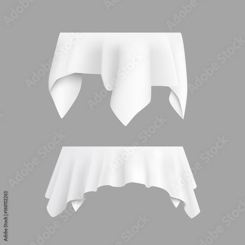 Two white round with table tablecloth