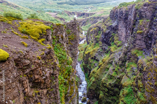 Botnsa river among rocks in Iceland