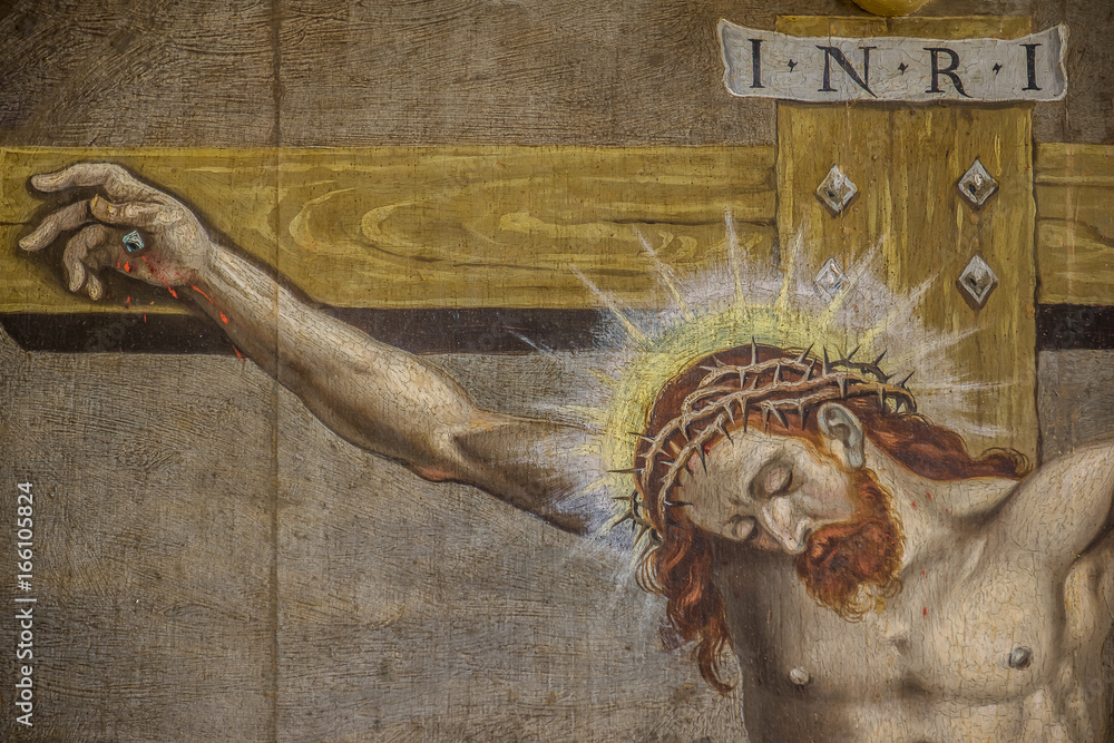 The crucifixion, Jesus on the cross with a crown of thorns and the heading INRI, an altarpiece