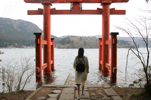 Japanese girl back, torii of Hakone, Japan