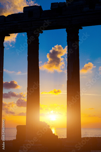 Ruins of an ancient Roman temple during sunset