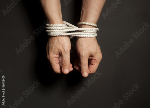 Photography Male hands bound with rope