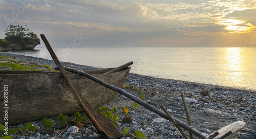 dugout boat on pangi beach, vanuatu photo