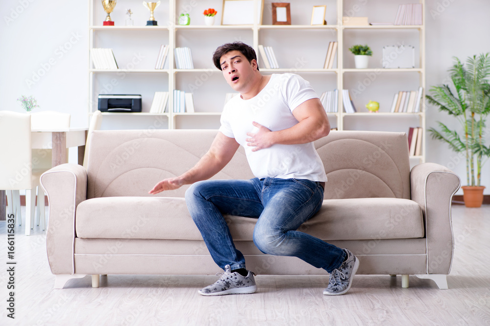 Man suffering from sick stomach and vomiting Man suffering from sick stomach and vomiting