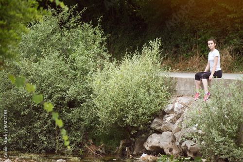 Focused Female Runner Resting