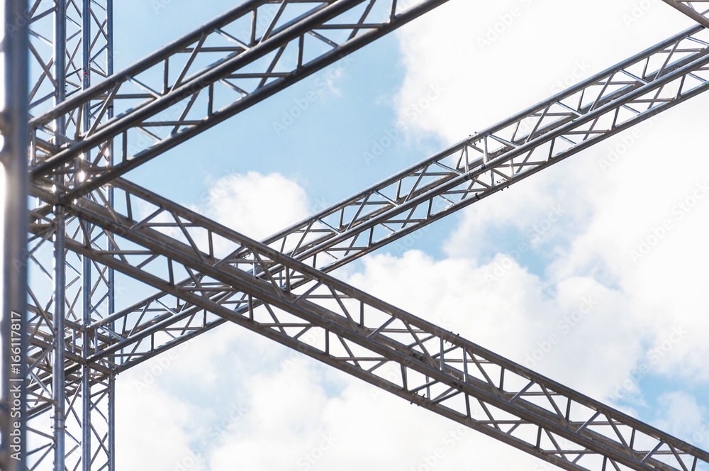 a part of stage metal construction against blue sky