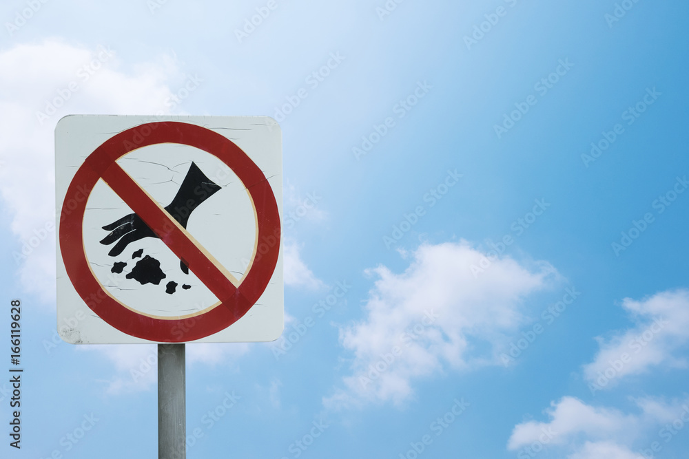 Sign tell do not trash on the ground isolated on blue sky background with clipping path included