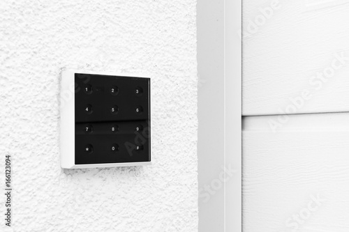 Black and White Modern Contemporary Keypad Design Garage Door photo