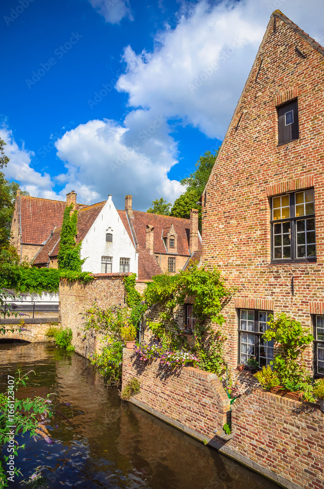 Beautiful canal and traditional houses in the old town of Bruges (Brugge), Belgium