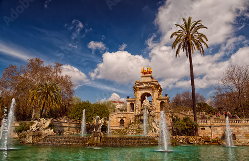 A panoramic view of the Parc de la Ciutadella, Barcelona, Catalonia, Spain including palm trees and the Quadriga de l'Aurora