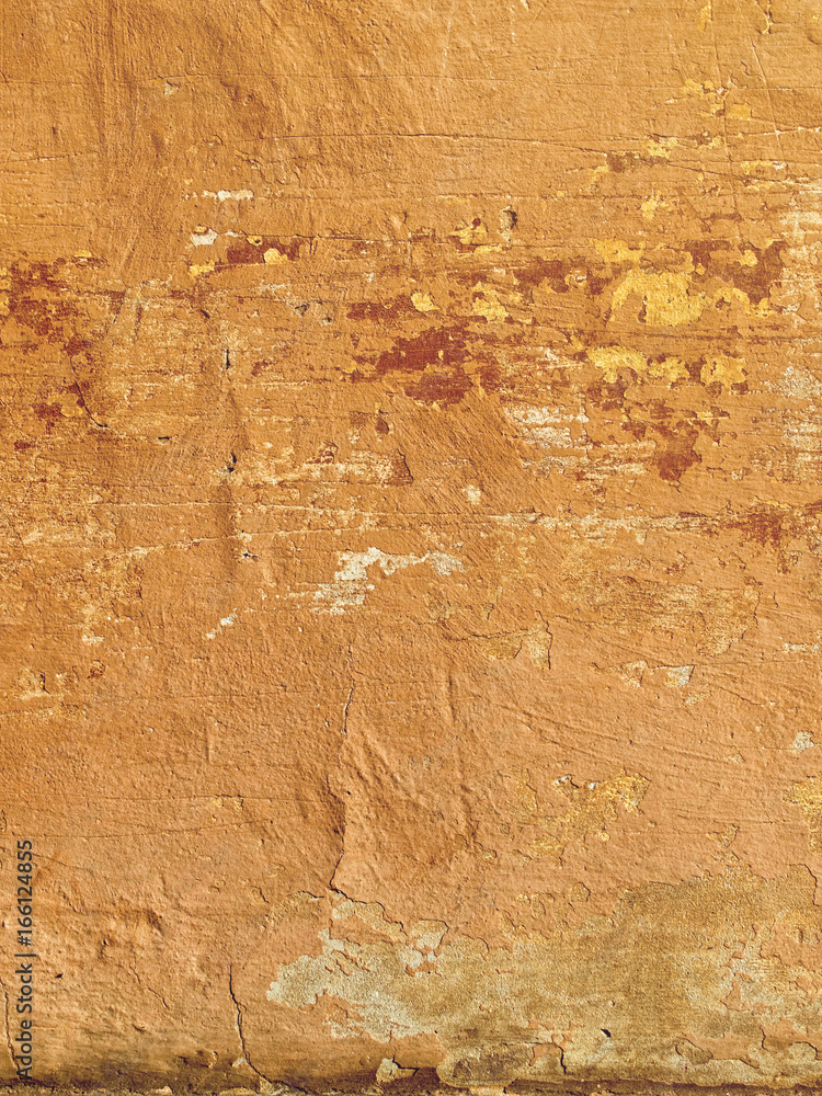 Old wall texture with traces of paint. Vertical image