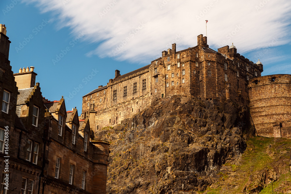 An wide shot of the Edinburgh Castle, Scotland, UK shot against a beautiful blue sky, Scotland, UK