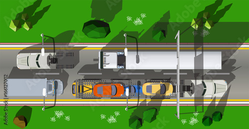 Top view road in the forest with car transporter truck