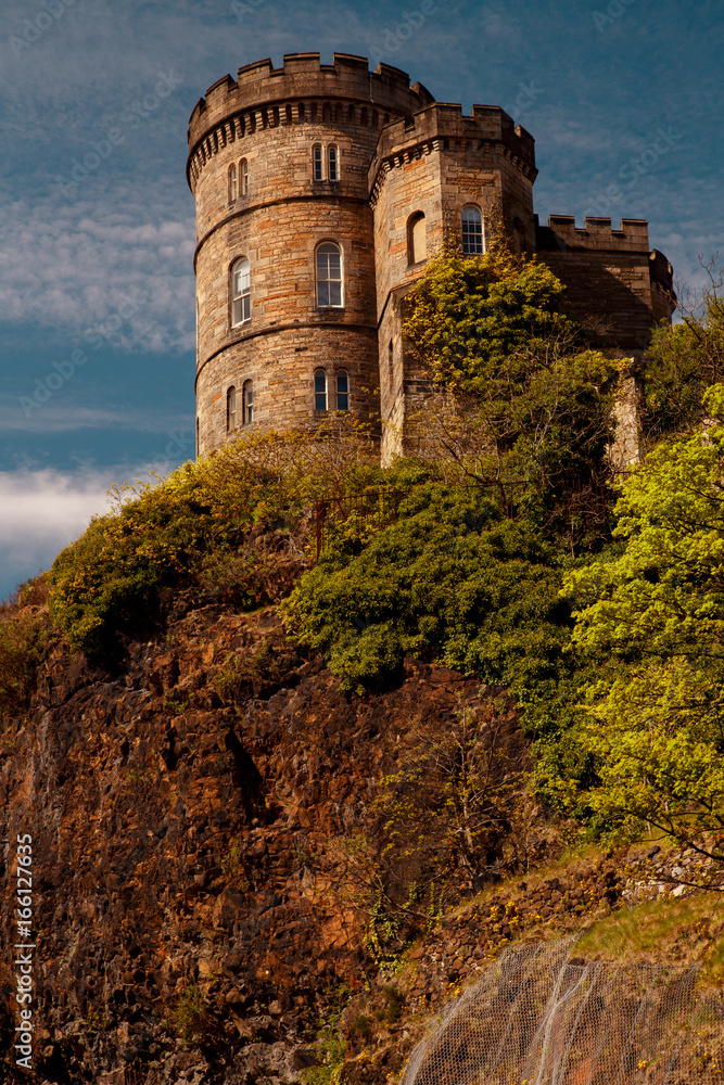 Portrait shot of the Edinburgh Castle, Scotland, UK shot against a beautiful blue sky Portrait shot of the Edinburgh Castle, Scotland, UK shot against a beautiful blue sky