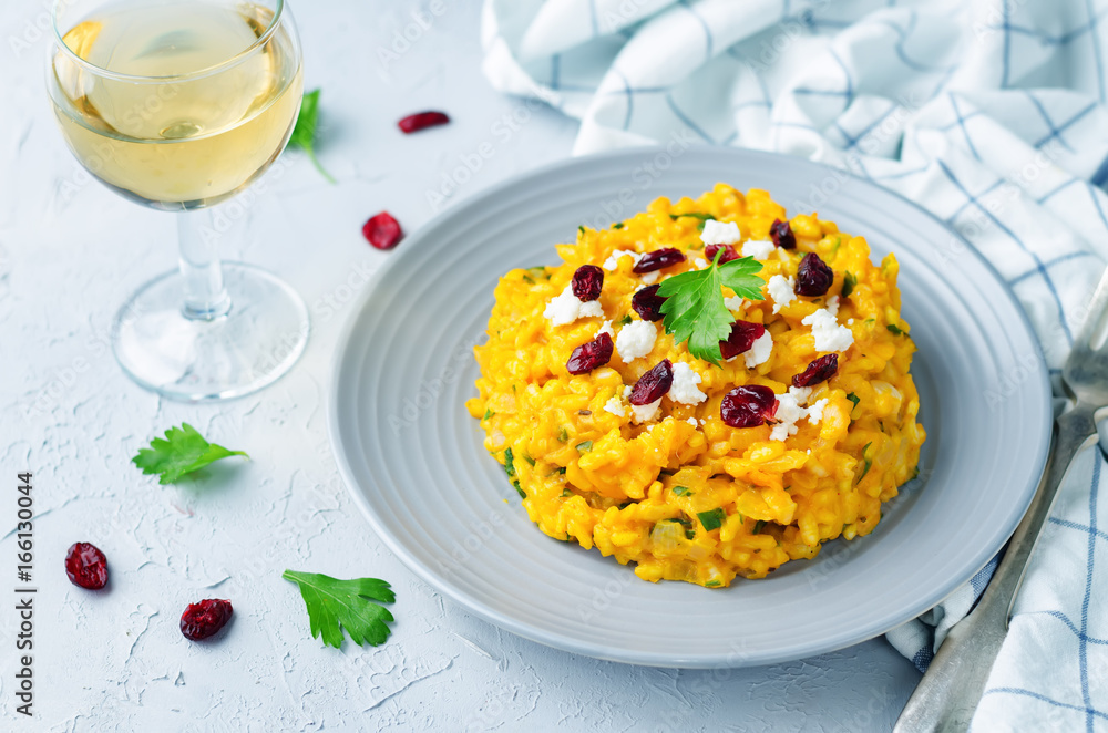 Pumpkin risotto with dried cranberries and goat cheese Pumpkin risotto with dried cranberries and goat cheese