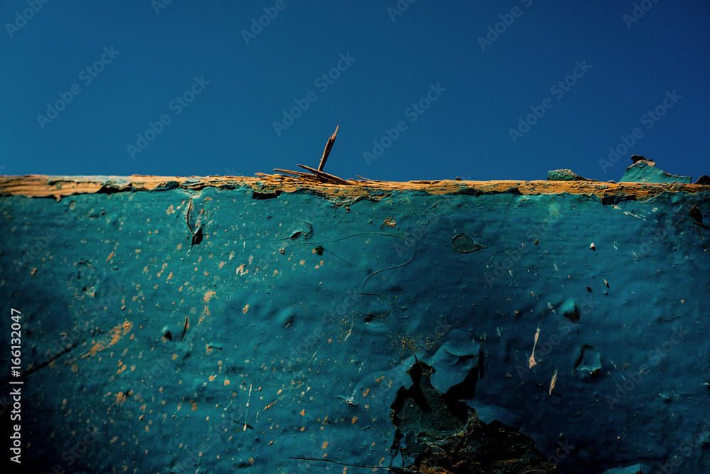 Naklejka premium Old wooden board covered with old paint