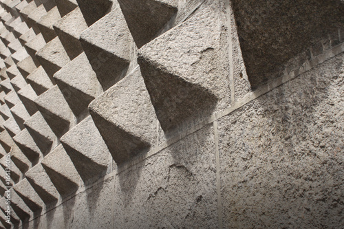 Stone Pyramid Pattern on Casa de los Picos Fachade in Segovia, Spain photo