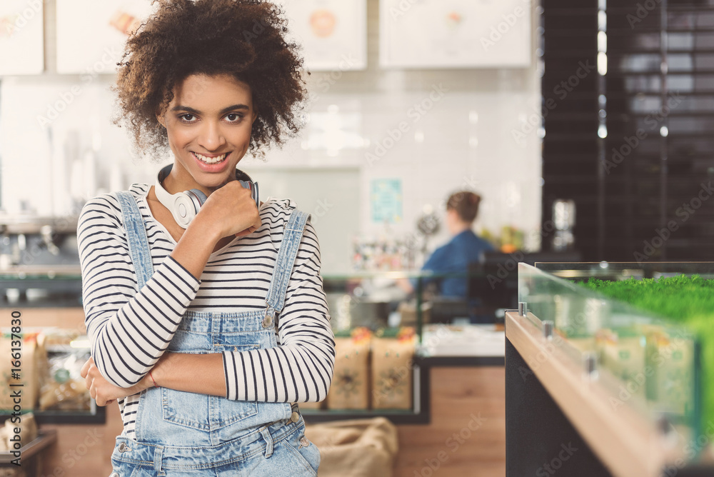 © Yakobchuk Olena - Cheerful modern girl is making purchases in vegan store