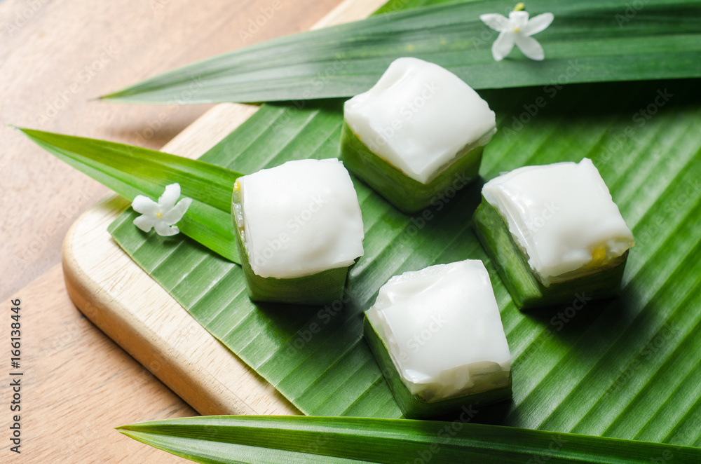 Thai jelly with coconut cream on green banana leaf. Thai jelly with coconut cream on green banana leaf.