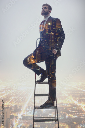 фотографія Man achieving business success striving for career advancement